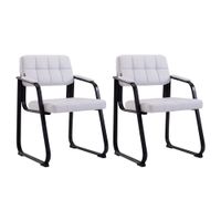 set de 2 sillas con patas de metal y asiento en simil cuero blanco