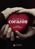 con la mano en el corazon
