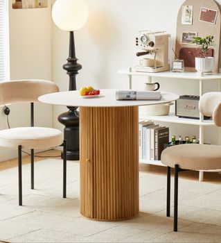 Mesa de comedor redonda de madera con tablero efecto mármol